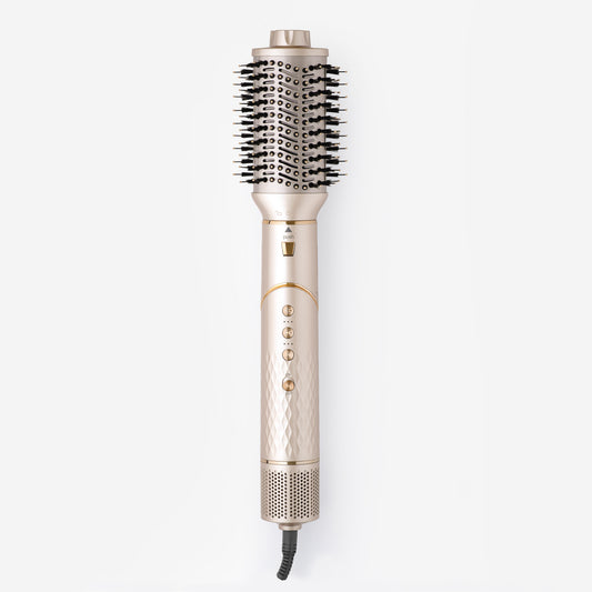 Hair styling tool with bristle brush head on a white background